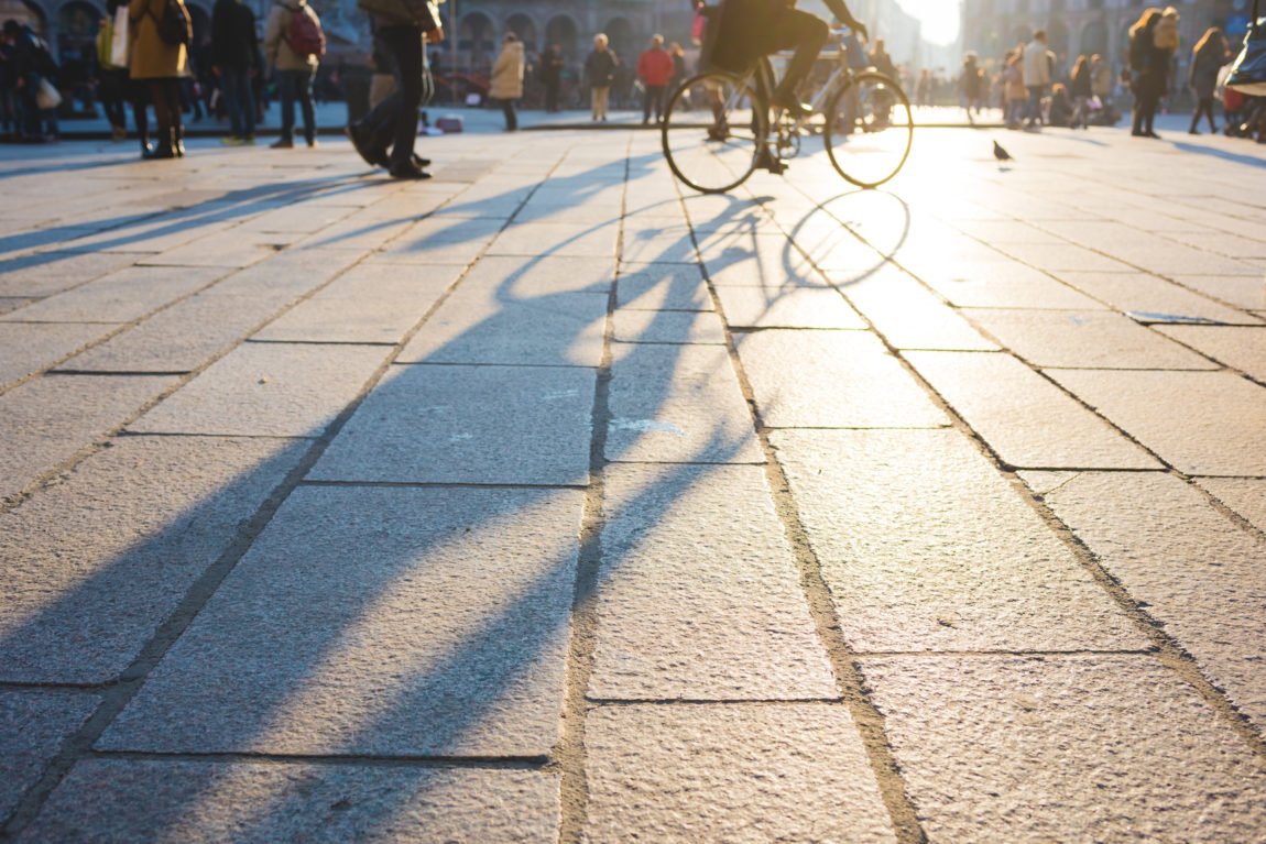 photodune-14931346-pedestrian-out-of-focus-walking-on-sidewalk-in-the-city-center-o-m.jpg
